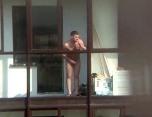 Nude stud on the balcony in spy hidden cam movie